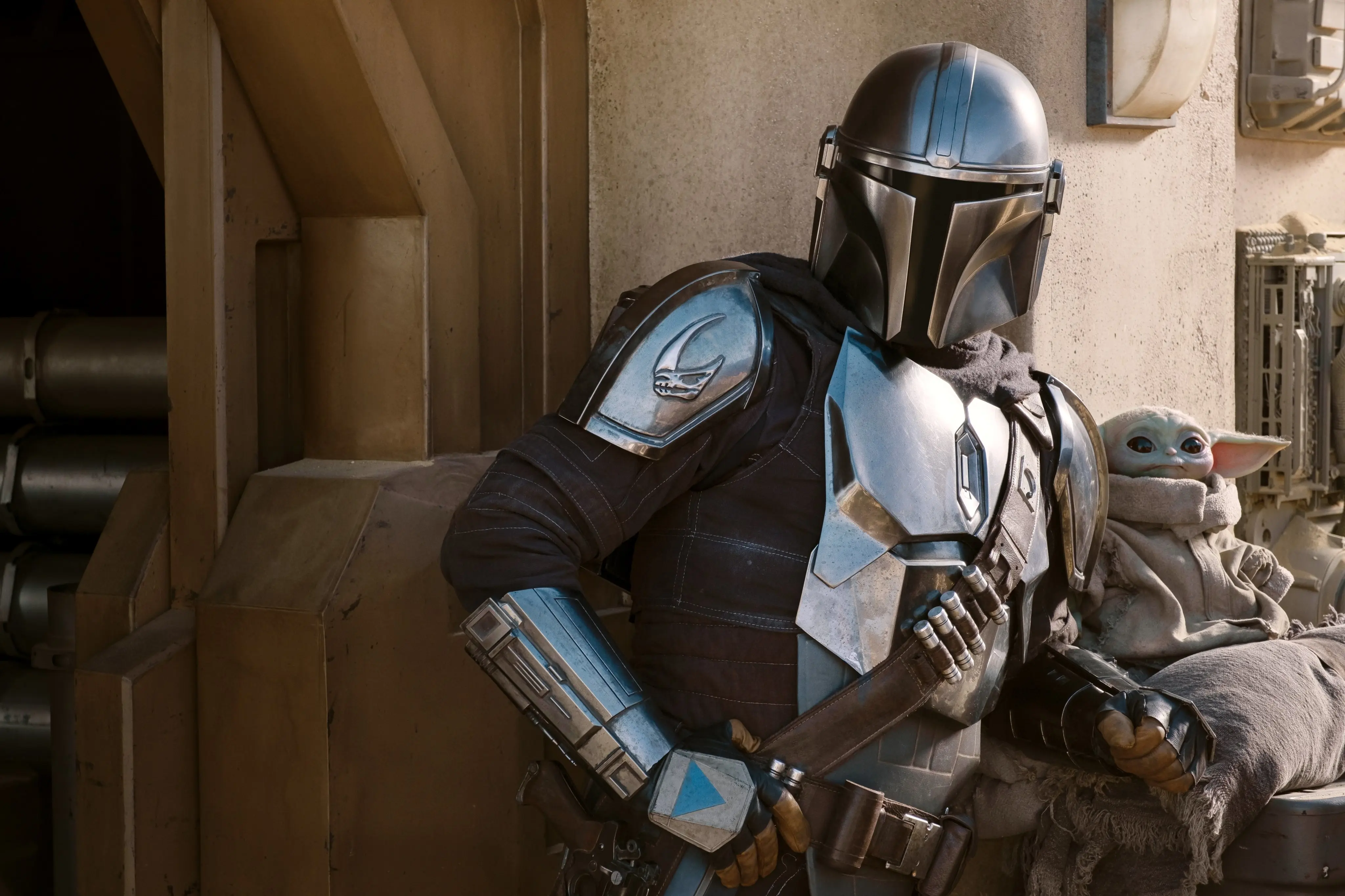 TV Show The Mandalorian silver armor and Baby Yoda | Background Image